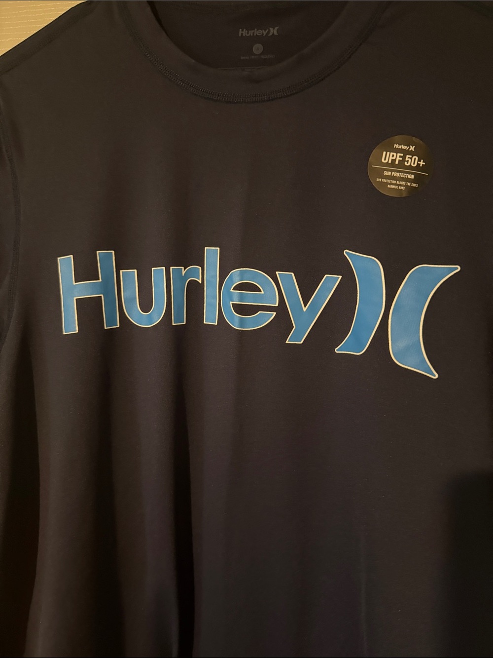 Hurley Navy Short Sleeve Logo Shirt with Bright Blue Graphic spf 50 - Picture 2 of 7